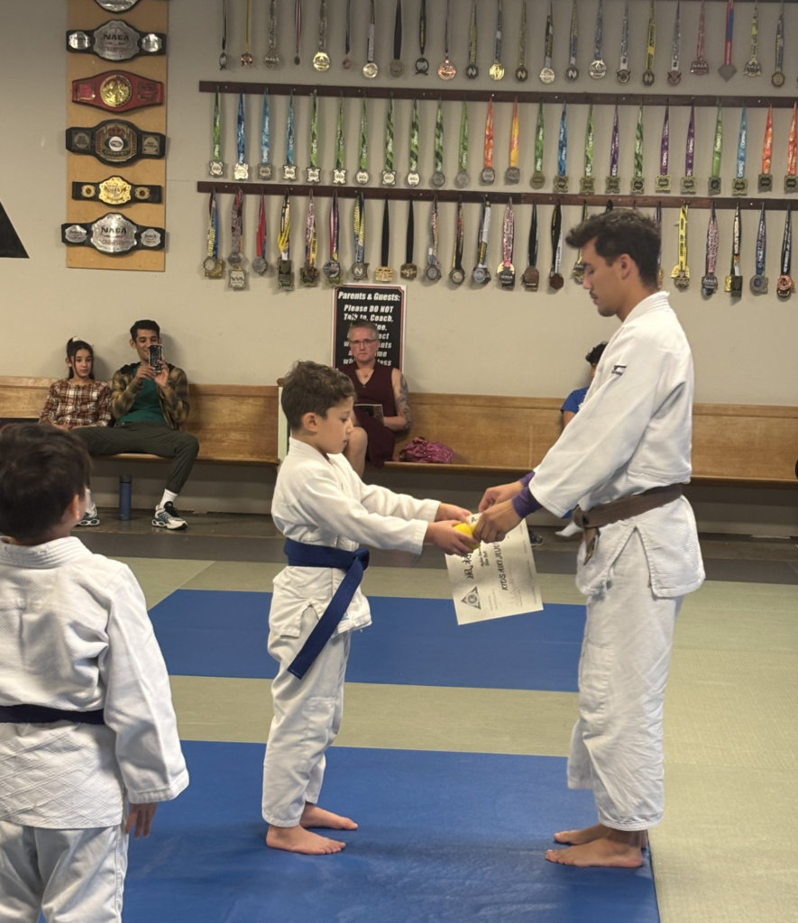 kids in Acworth martial arts class improving focus, discipline, and listening skills through martial arts training