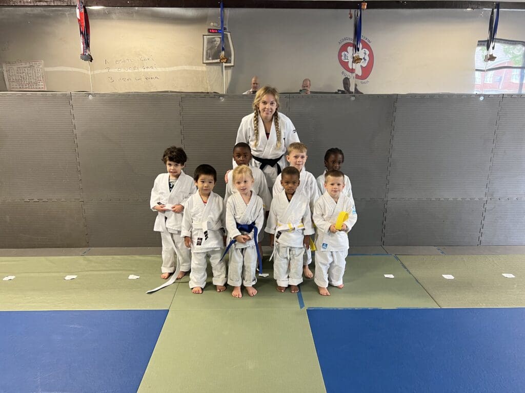 kids in Acworth martial arts class improving focus, discipline, and listening skills through martial arts training